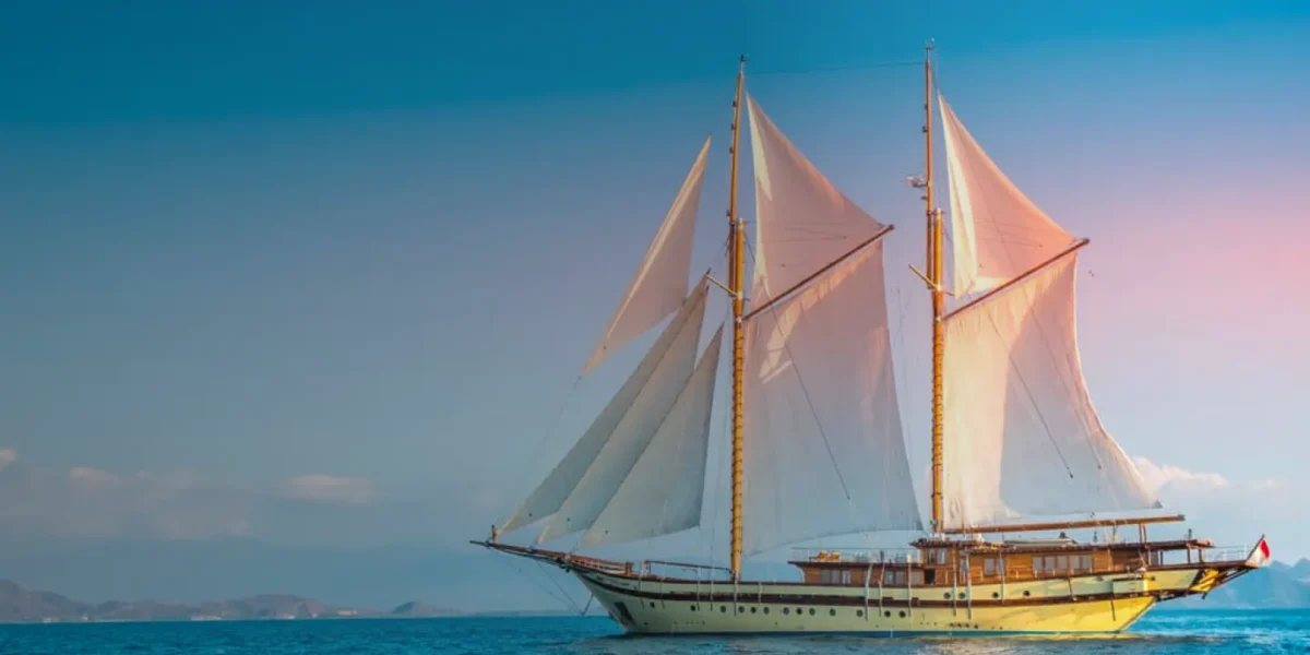 a Phinisi boat cruise the ocean